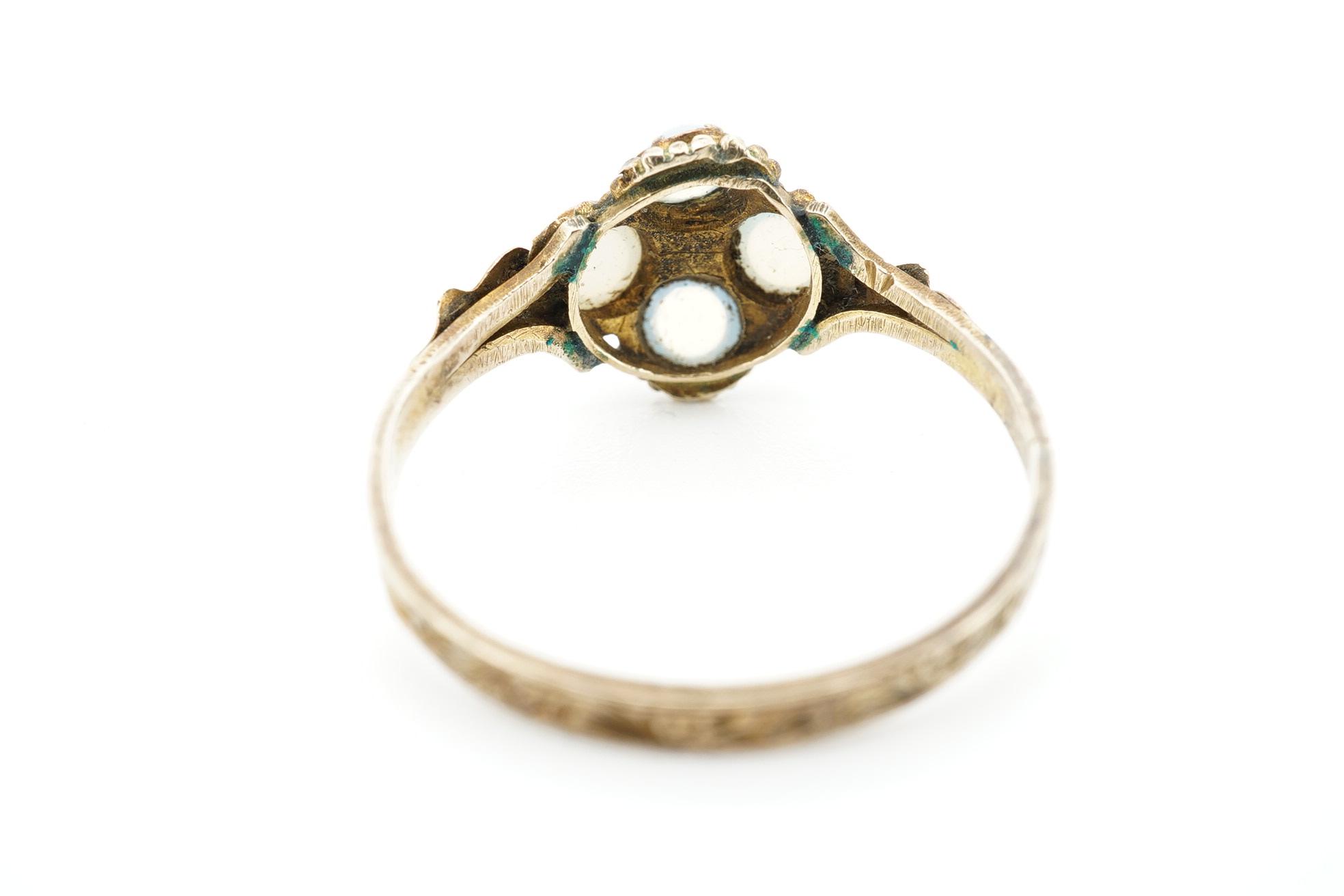 An early 20th century 9ct gold and opal cluster cluster set ring, size M, a 9ct and four(ex five) stone set opal half hoop ring and an 18ct and five stone diamond set half hoop ring. Condition - poor to fair